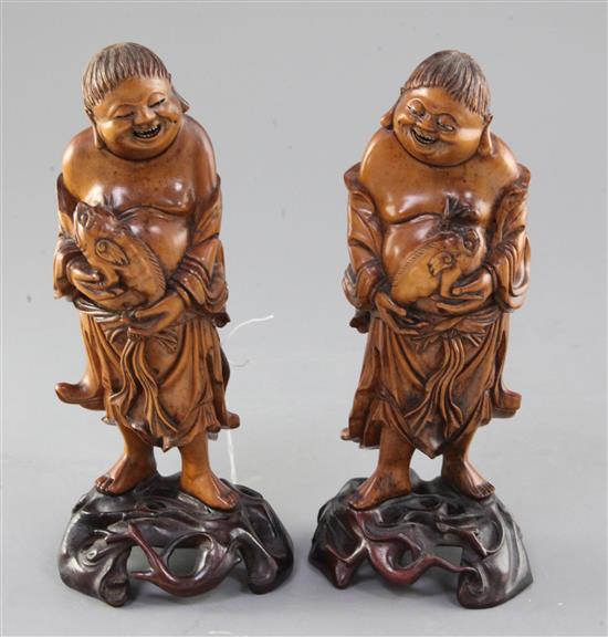 A pair of Chinese boxwood figures of Liu Hai, 19th century, height 21cm